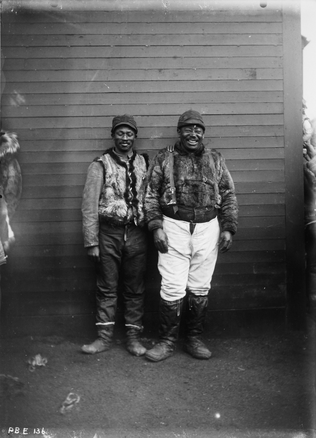 Black whalers posing for a photo at Point Barrow, c. 1900s