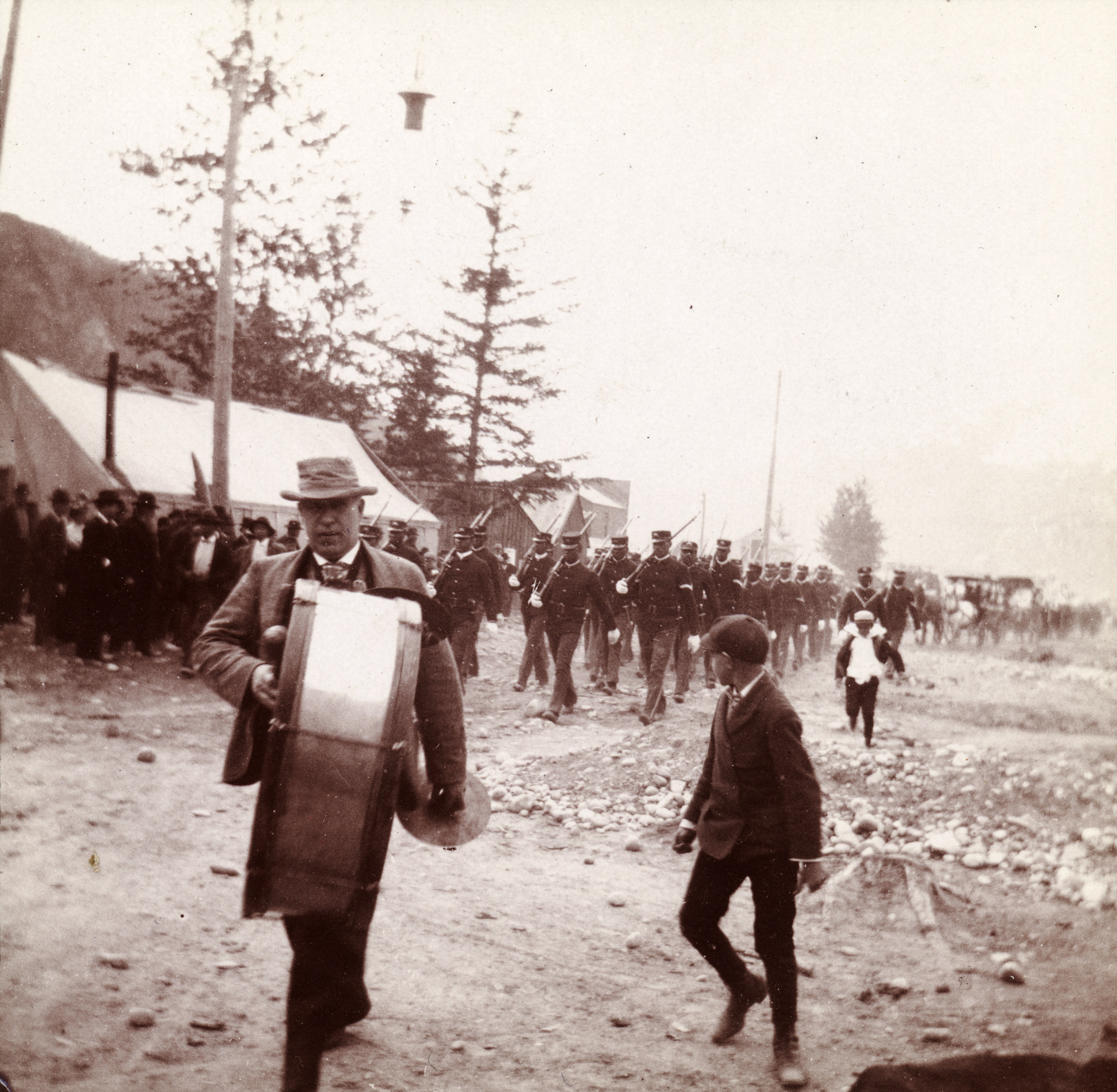 Company L of the 24th Infantry Division marching in a Skagway parade, 1899