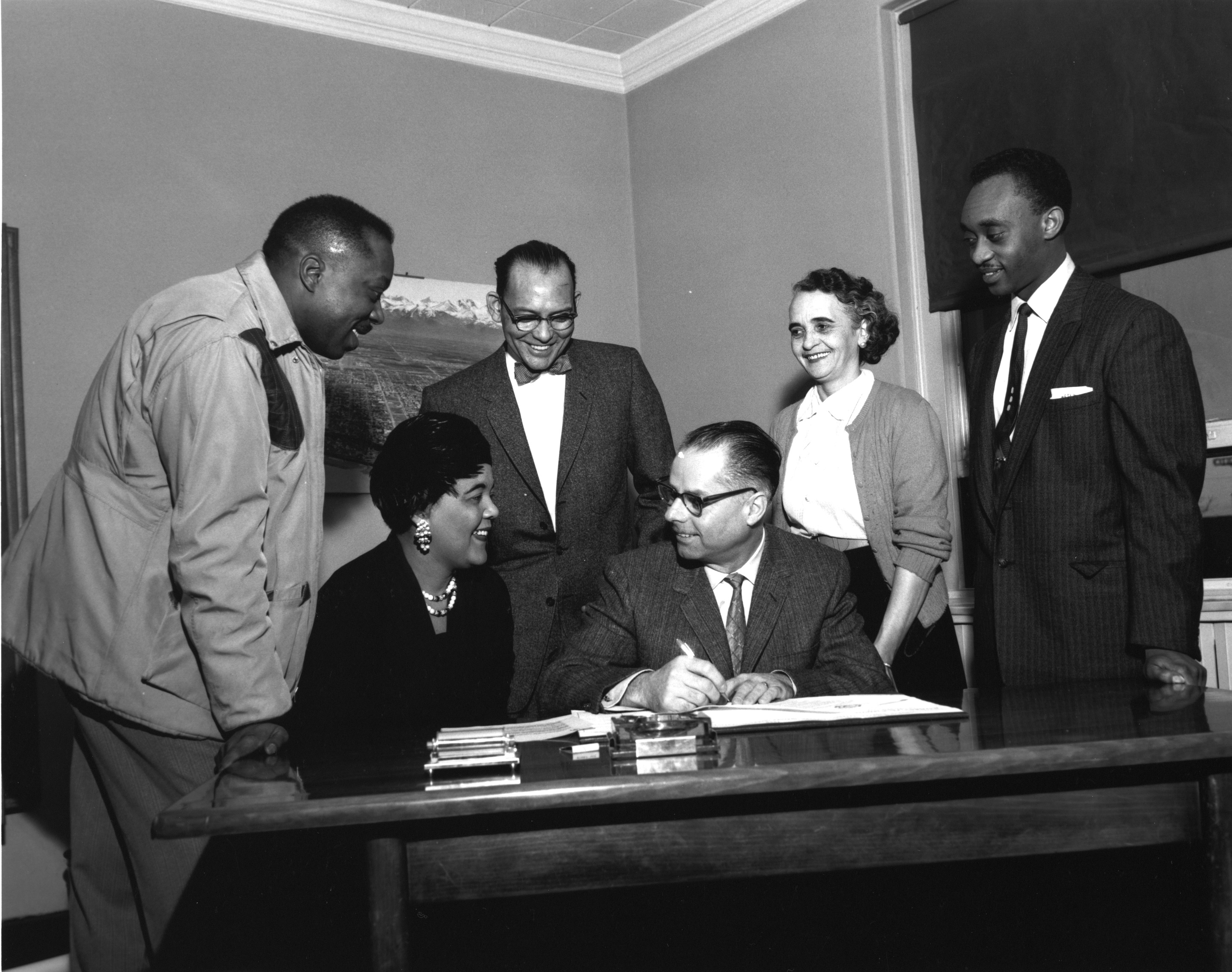 Anchorage Mayor George Henry Byer with members of the Alaska NAACP, including Blanche McSmith (seated), Anchorage City Hall, 1959