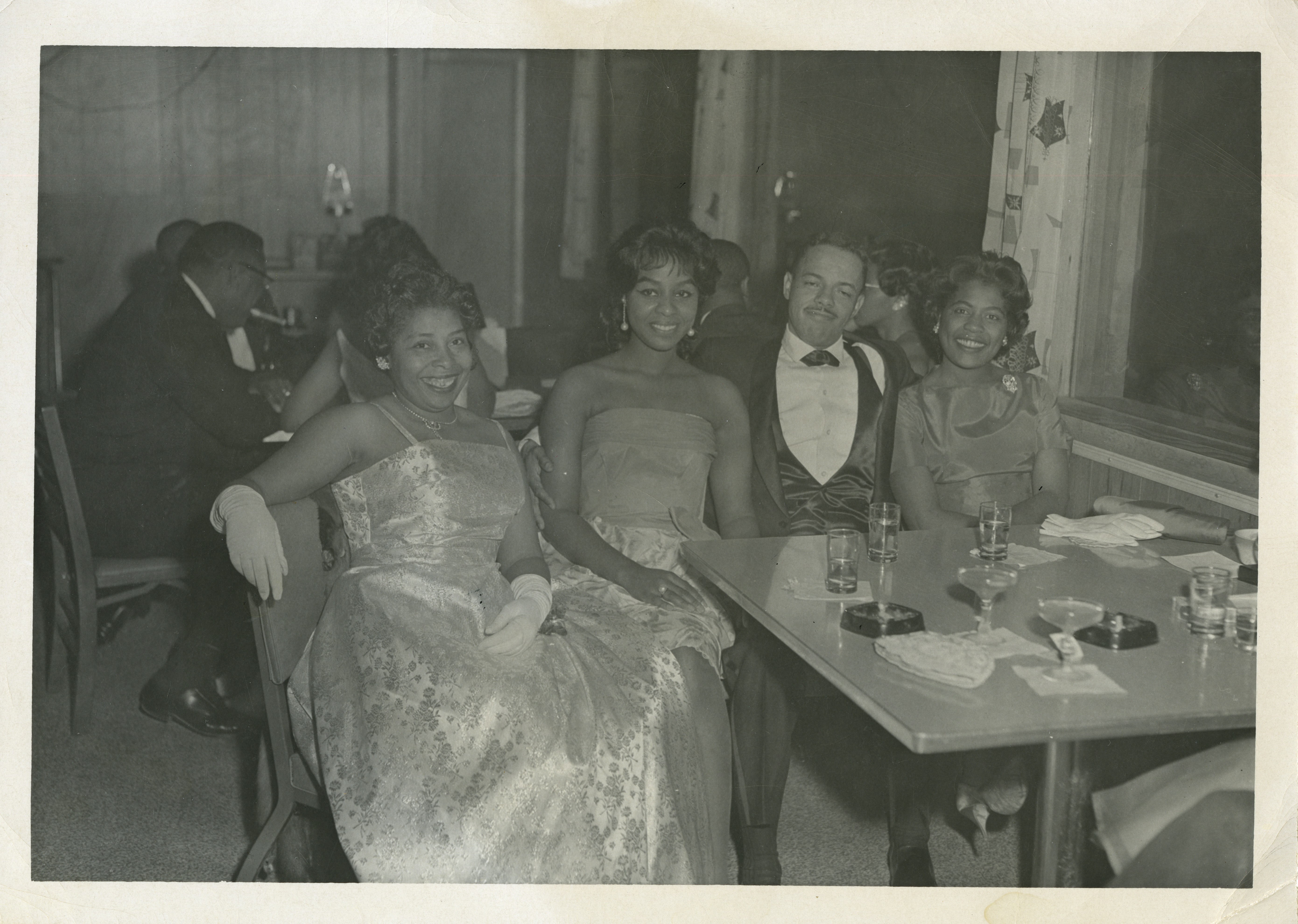 Theresa Quarles at New Year's Eve celebration black-tie event, Anchorage, ca. 1960